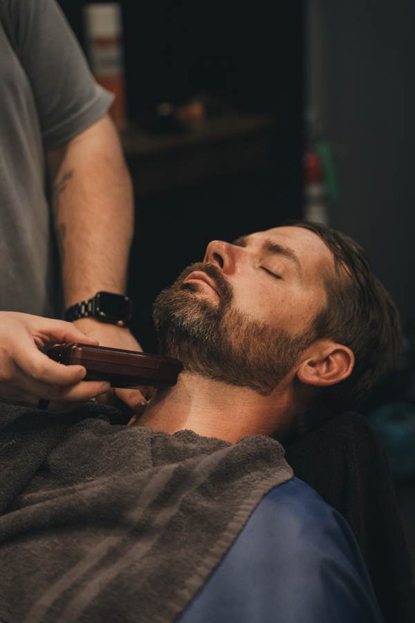 The Cave barber at work — The Detail