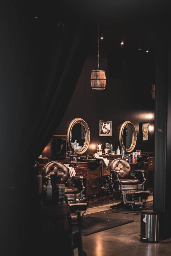 The Cave barber at work — The Floor