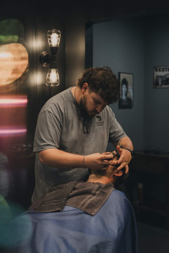 High and tight cut with a razor-sharp hairline at The Cave, Springdale AR